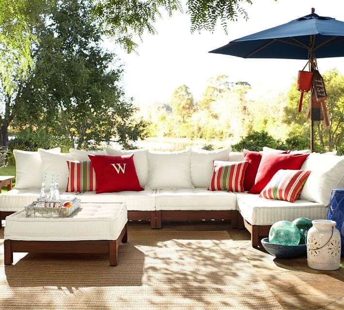 White sofa cushions red patio