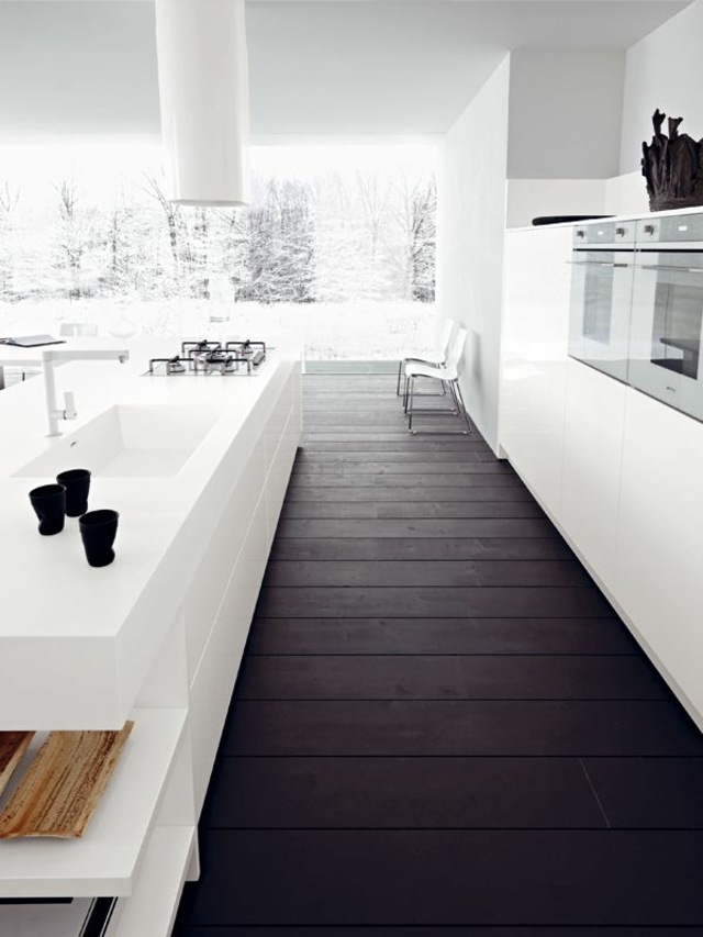 White minimalist kitchen dark wood floor
