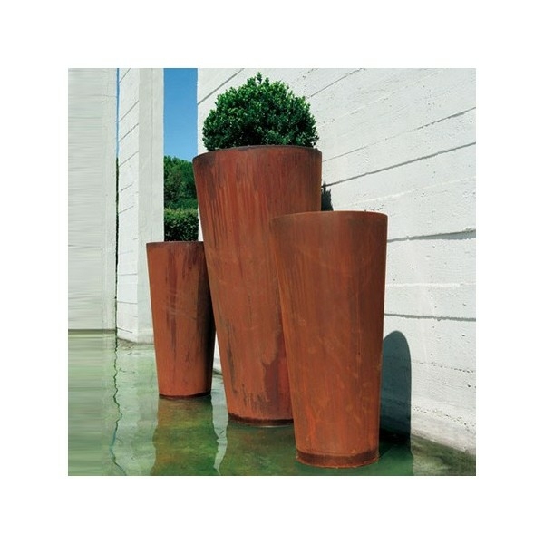 DeCastelli vases metal outside