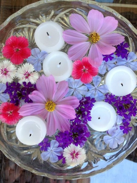 Multicolored flowers combined candles