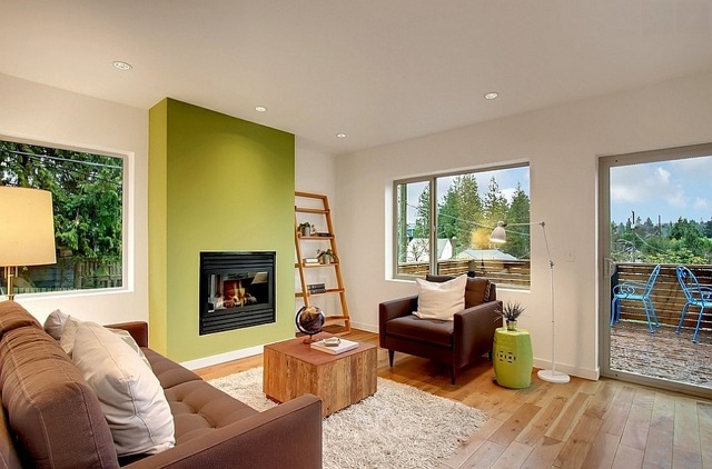 Stylish living room with a green accent wall