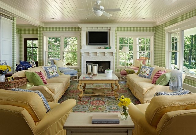 Green living room with a persian rug