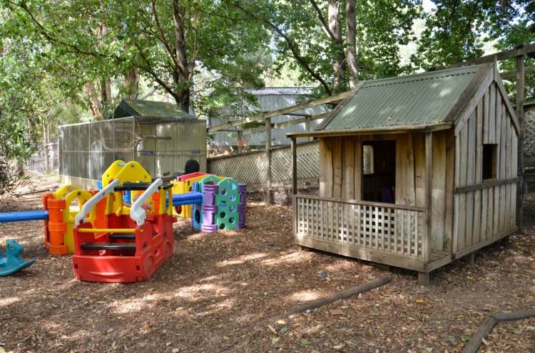 playground child houses woods