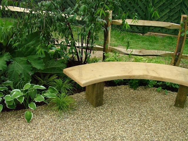 modern garden layout raw wood bench