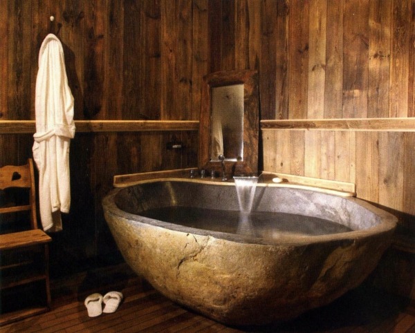 unusual island bathtub rustic natural stone