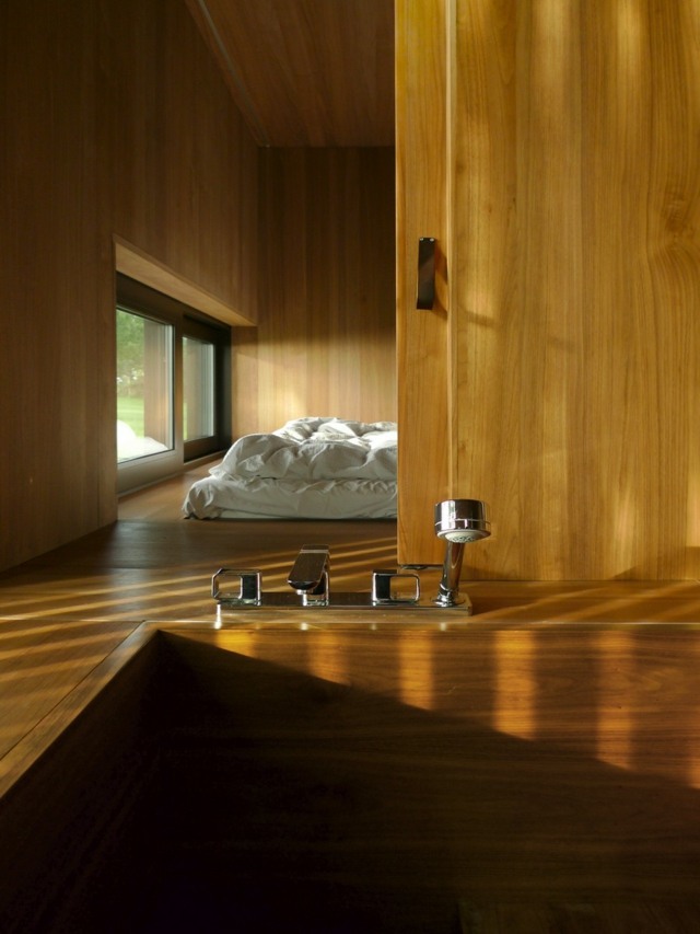 built-in bathtub design wood bedroom