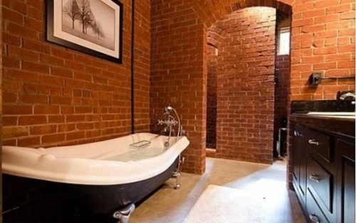 long bath black white bathroom bricks