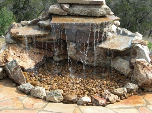 garden pond stone pebble waterfall water