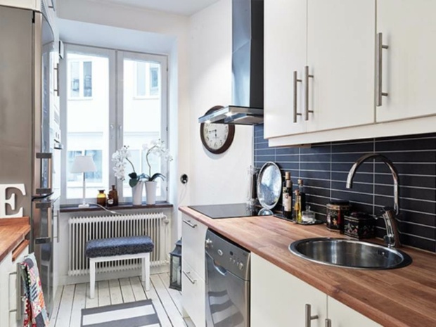 beautiful compact kitchen with wooden countertops