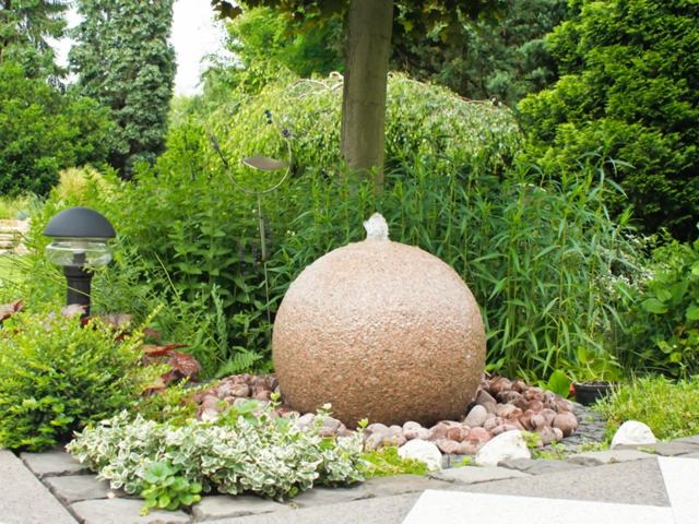 beautiful fountain round stone garden