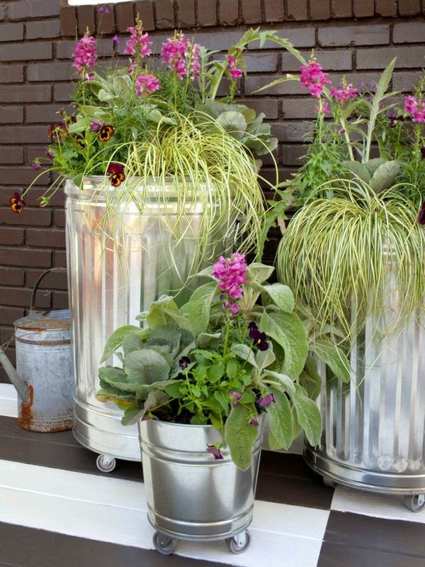 metal cans on wheels flower pots