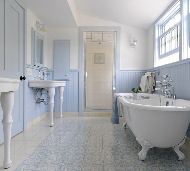 light blue white bathroom bathtub on feet