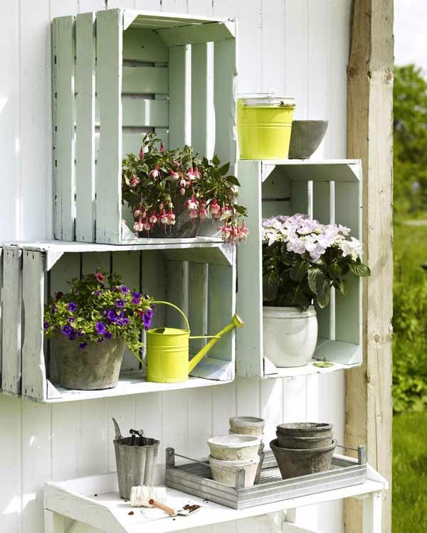 recycling boxes in garden shelves