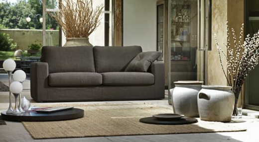 brown two-seater sofa