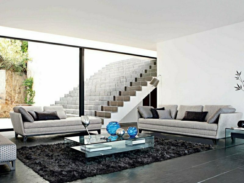 living room interior black floor mats decorative object sofa gray rock bobois design paris