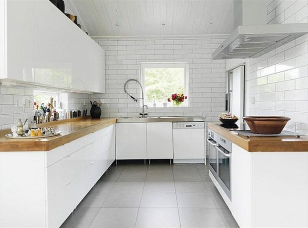 white wall tile contrast with wooden countertops