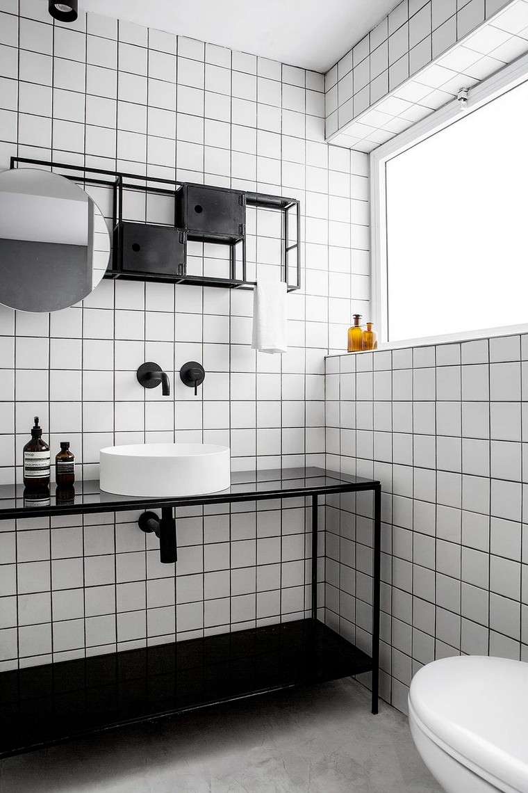 en-suite bathroom-tile-black-white-furniture-sink