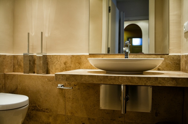 beige stone bathroom tile