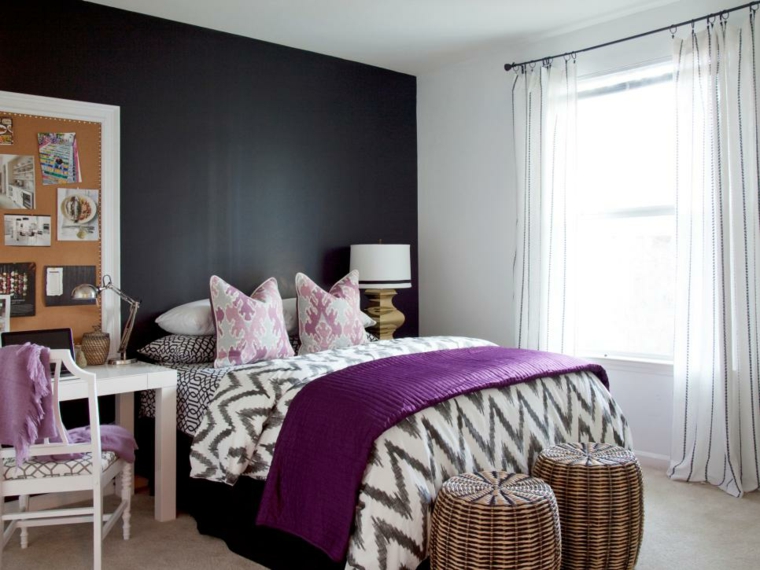 bedroom with black wall purple accents