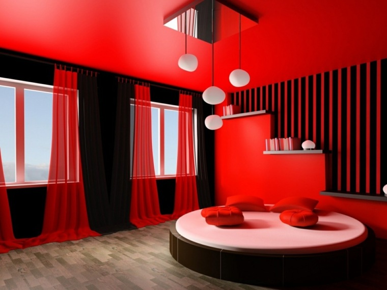 red and black room with round bed