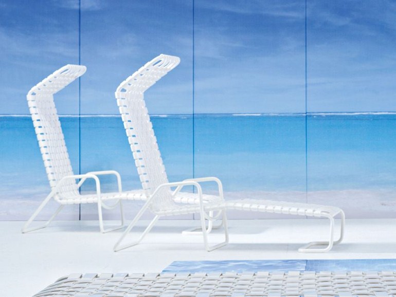 white lounge chairs with foot rest outdoor furniture design by Paola Navone Gervasoni in braided resin