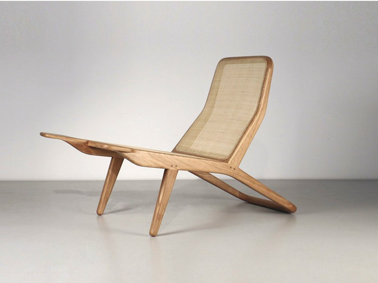 Chilean ash wood lounge chair with armrests design marco sousa santos