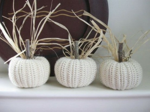 white knitted pumpkins