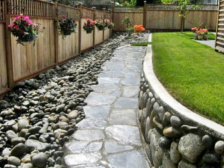 idea fence wood palisades garden stones