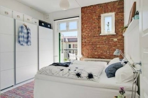 white color bedroom wall red bricks