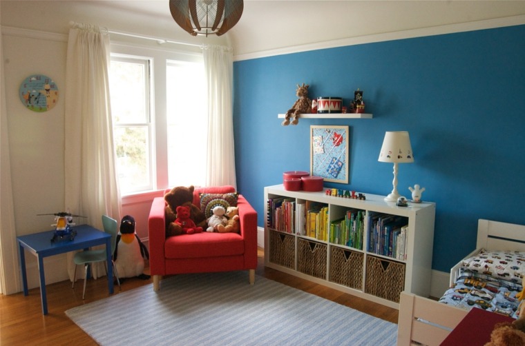 primary color red armchair wall blue