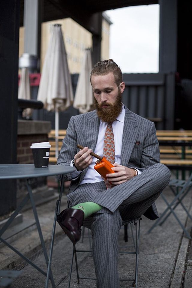 bearded man red haircut elegance and modernity