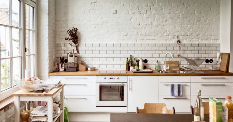 white kitchen worktop wood decoration-industrial-wall-bricks
