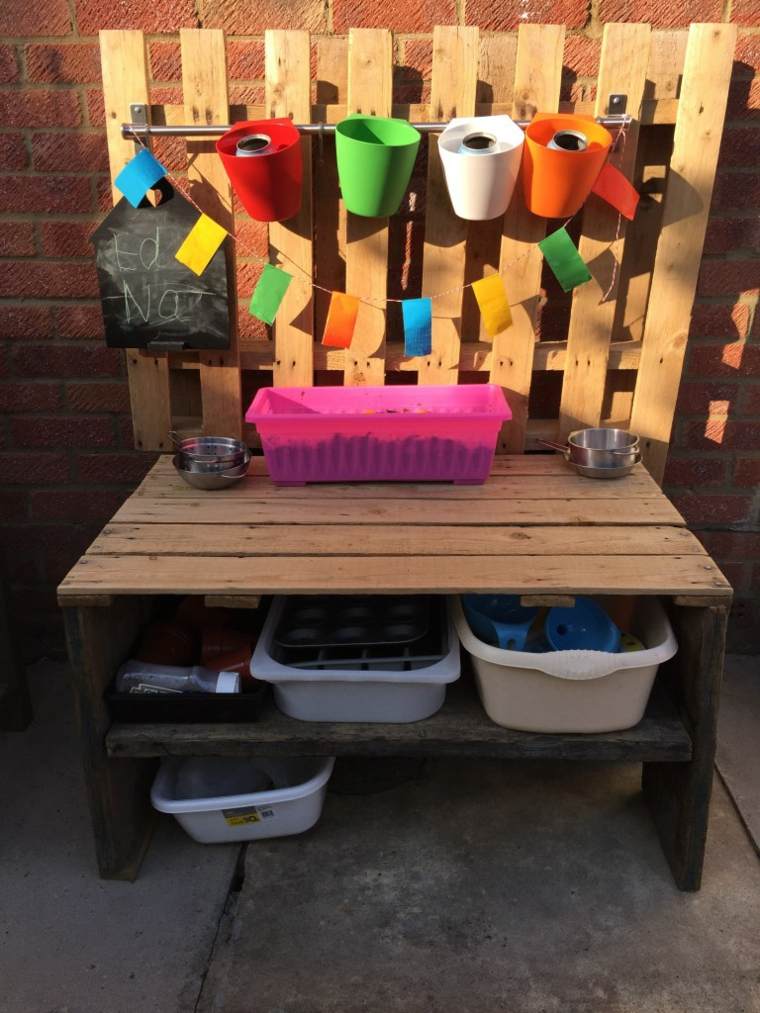 wood kitchen with colored buckets