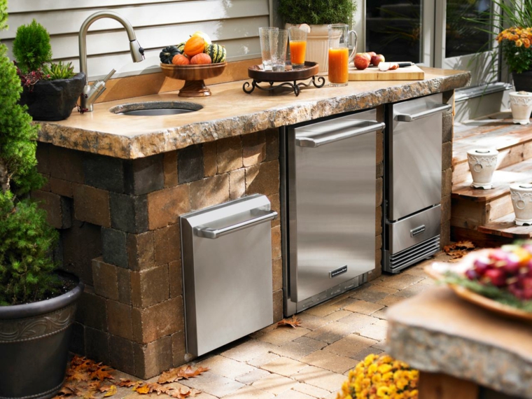 well equipped garden kitchen stainless steel stone