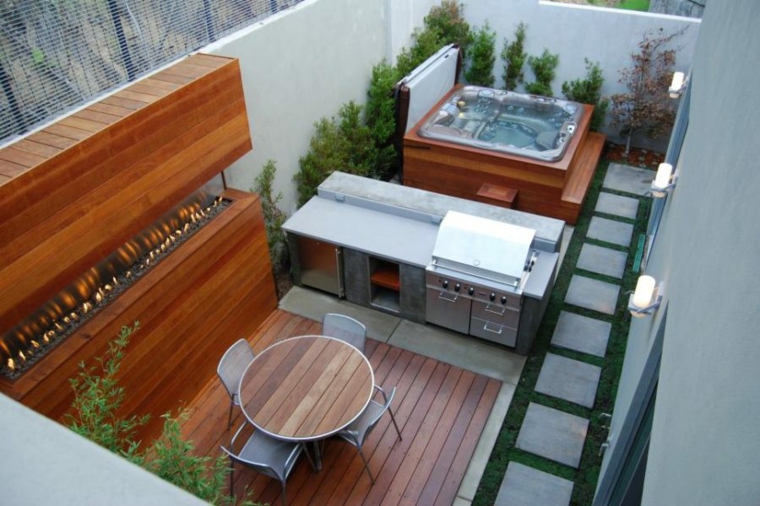 outdoor kitchen garden behind home by Jeff Troyer Associates