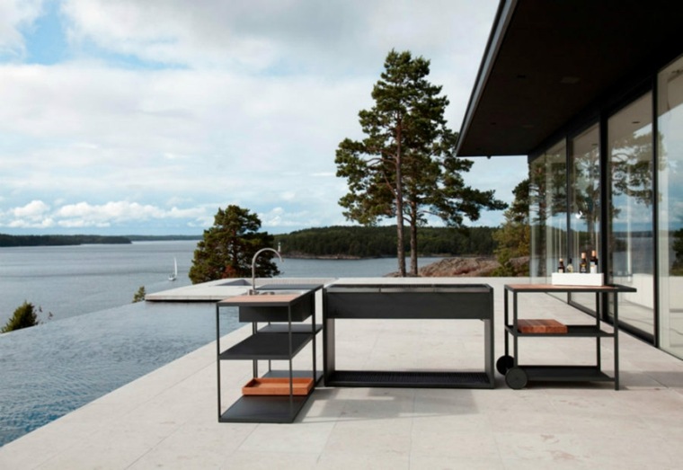 outdoor kitchen house edge lake by Roshults