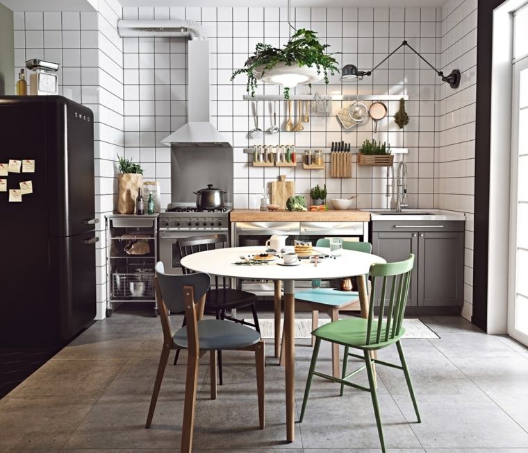 Nordic kitchen in white fridge black green chairs blue