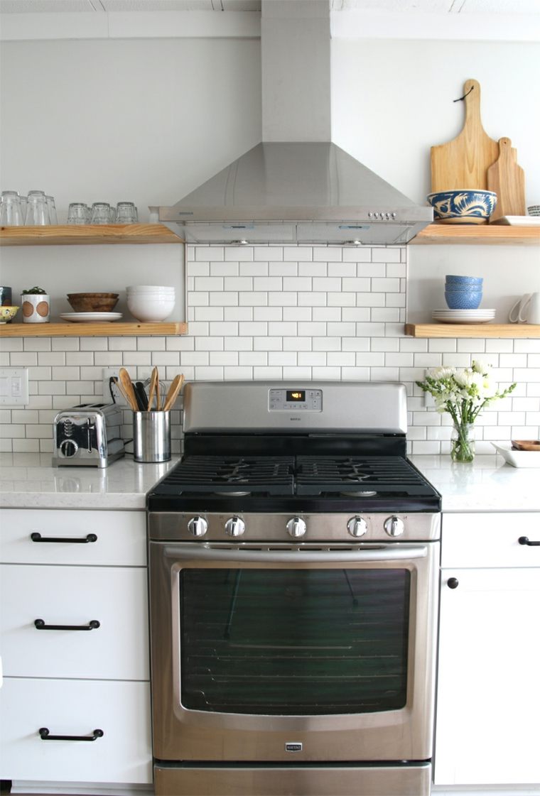 piano kitchen cooking idea wall tile white hood extractor