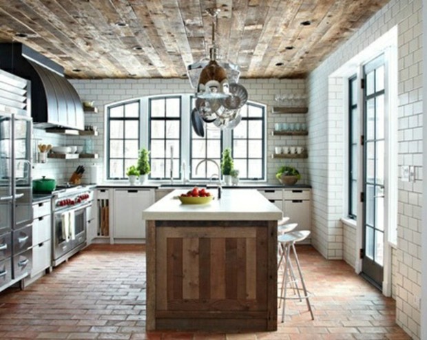 rustic kitchen with paved floor and parquet ceiling