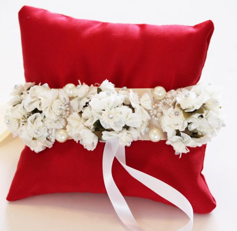 wedding decor white and red cushion-flowers-white-wedding rings