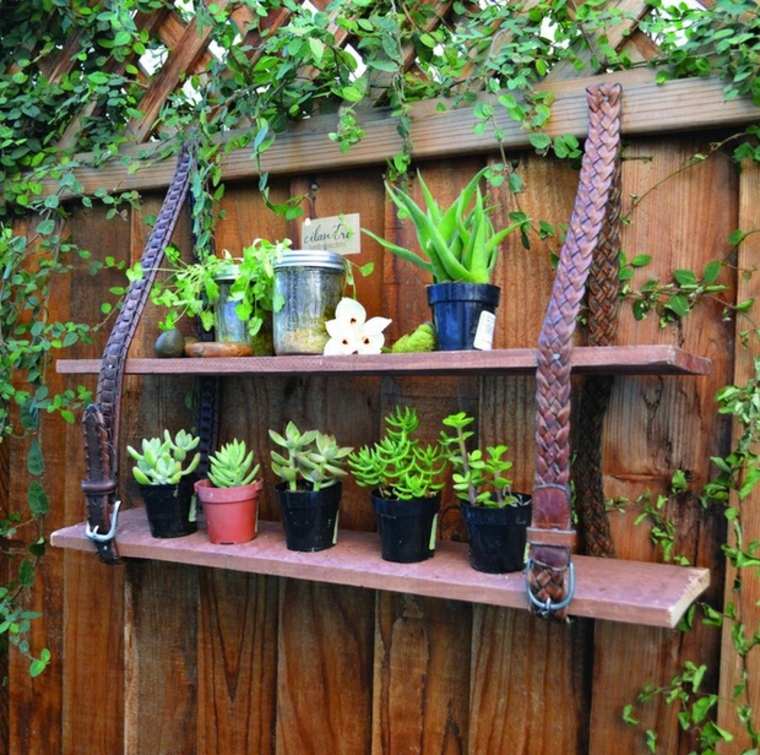 garden decoration idea wood fence shelves flower pots