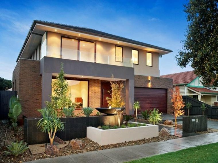 garden landscaping in front of the house