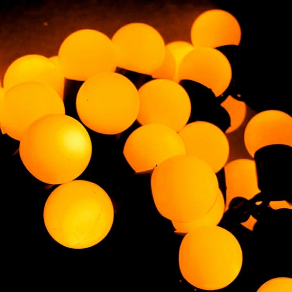 christmas decoration in yellow garlands lamps