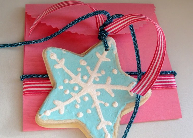 christmas decoration in salt dough blue star white red ribbon