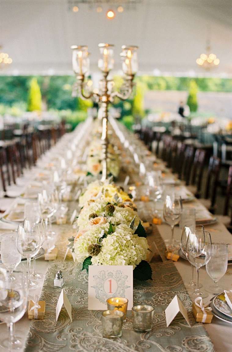 wedding table deco with white flowers stack for table