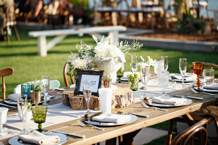 white flowers decorate wedding tables