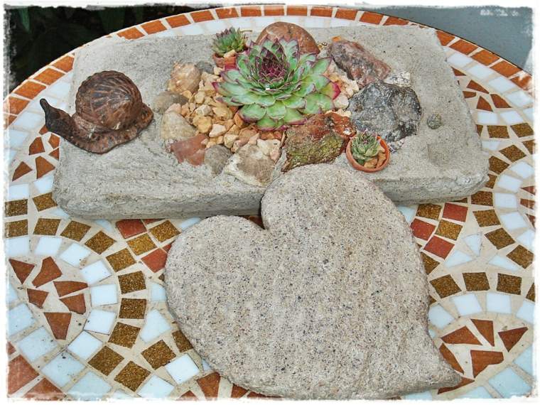 decorate her garden with stone heart