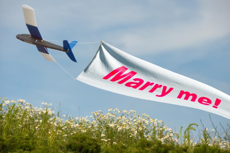 application-in-marriage-sky aircraft sail-insciption