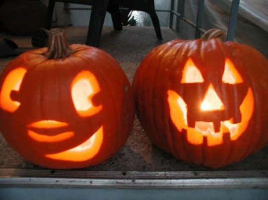 two pumpkins decorated