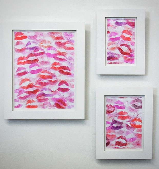 lip prints with red on canvases